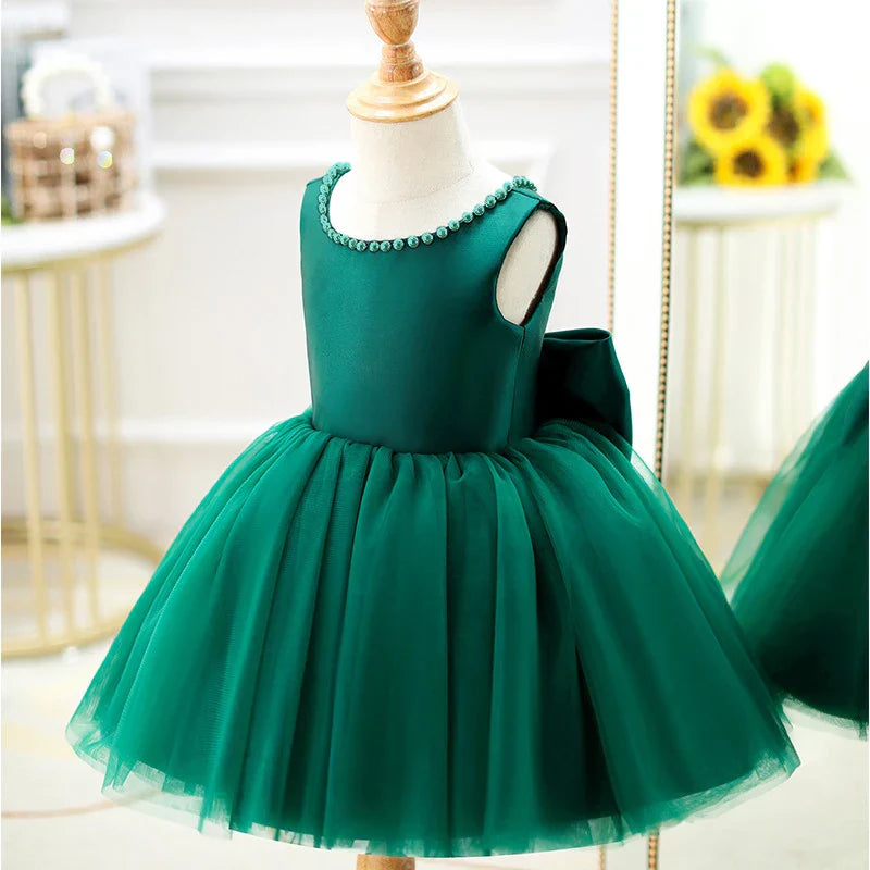 Peça Essencial Glamour Kids 💖 Vestido Com Laço Extra Grande e Pérolas Finas Que Deixam Sua Filha Deslumbrante e Preparada Para Marcar Presença com Muito Estilo! 👑💍