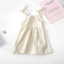 Vestido 🌿 Brisa de Infância ☁️ Estilo Casual 👗 com Laços Ajustáveis 🎀 Evasê Soltinho ✨ Bolsinhos para Tesouros 🔍💖