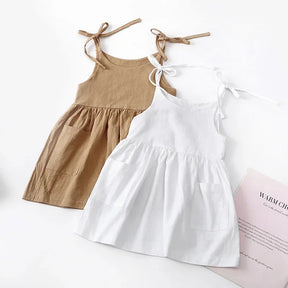 Vestido 🌿 Brisa de Infância ☁️ Estilo Casual 👗 com Laços Ajustáveis 🎀 Evasê Soltinho ✨ Bolsinhos para Tesouros 🔍💖